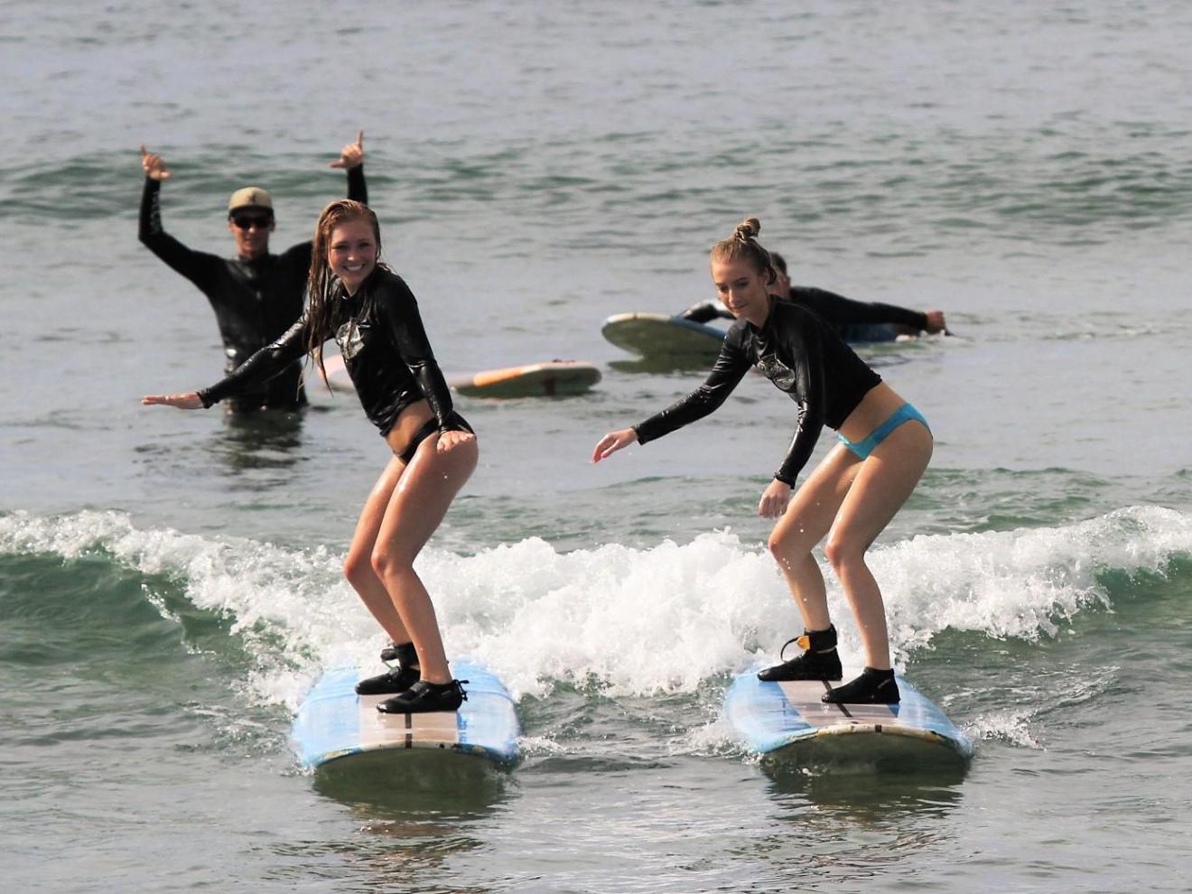 a person riding a wave on a surfboard in the water