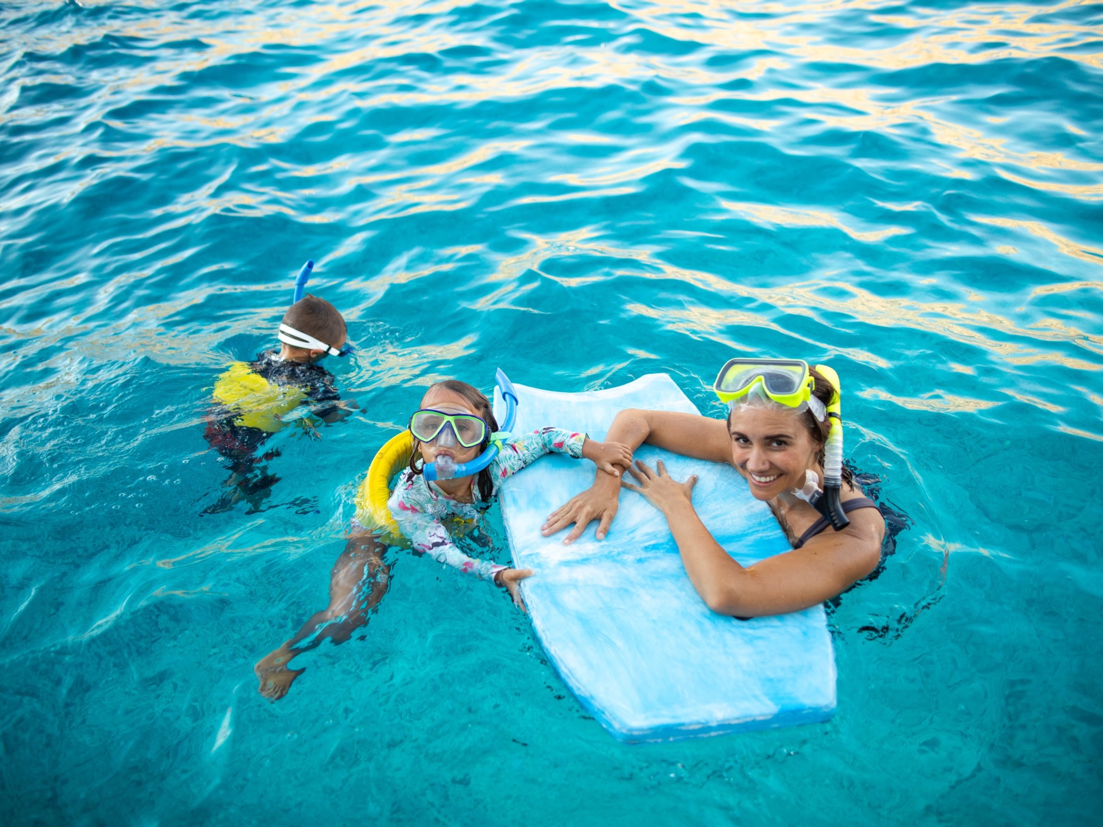 a person swimming in a pool of water